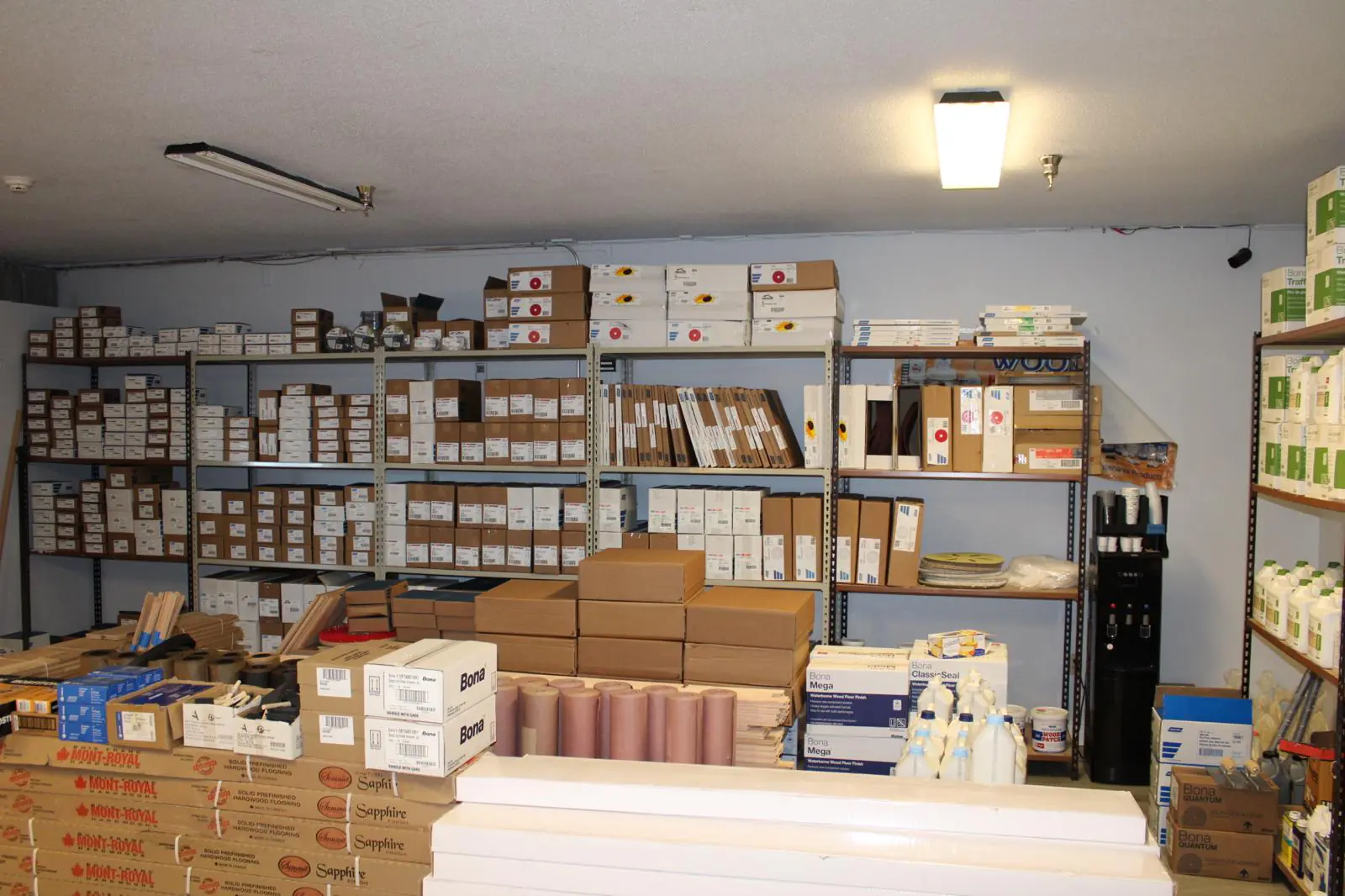 JR Hardwood Supplies stockroom with Bona products and flooring supplies in Falmouth MA